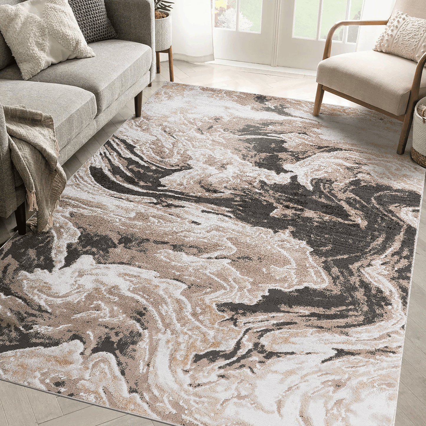 Abstract area rug with beige and light brown cloud-like swirls and dark gray
