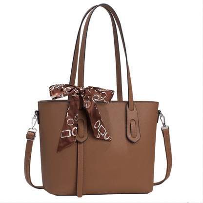 Brown tote handbag with top handles, front zipper pocket, and adjustable shoulder strap.