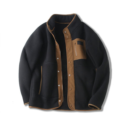 Black jacket with brown accents on a white background