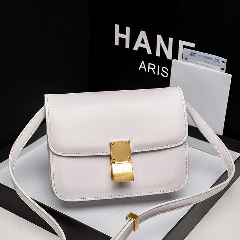White retro leather shoulder bag, front flap with gold square clasp and crossbody strap