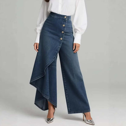 Medium blue denim straight-leg pants with asymmetrical ruffle overlay and front buttons