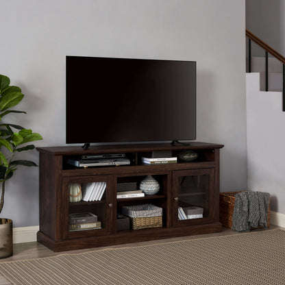 Brown farmhouse TV stand with open cubbies and two cabinet doors, TV centered on top.