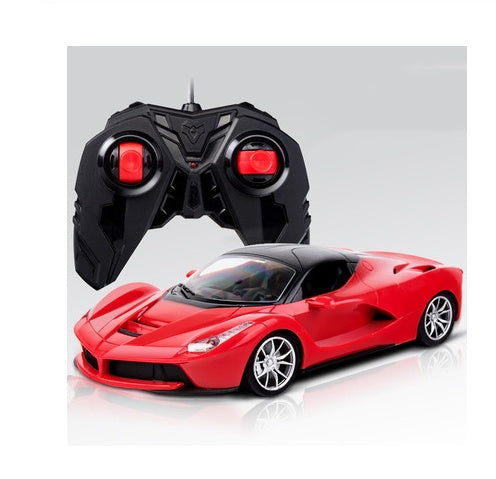 RC racing car model in red with remote controller, angled front view