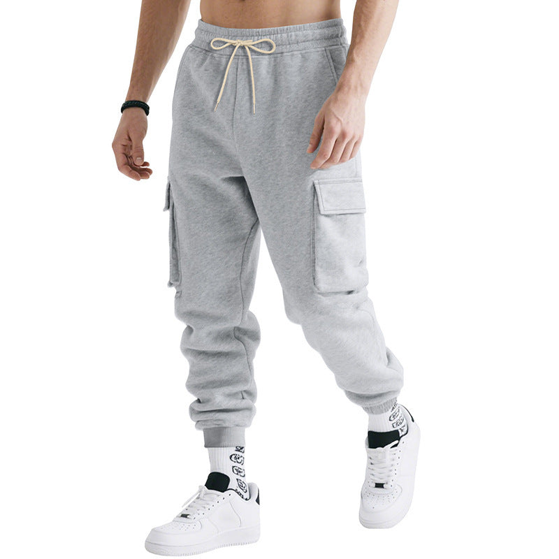 Men's loose cargo jogger pants with drawstring waist, side cargo pockets, light gray, ribbed cuffs.