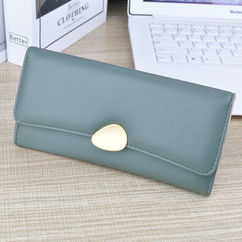 Teal green long wallet with card holder and heart-shaped snap clasp, slim foldover design