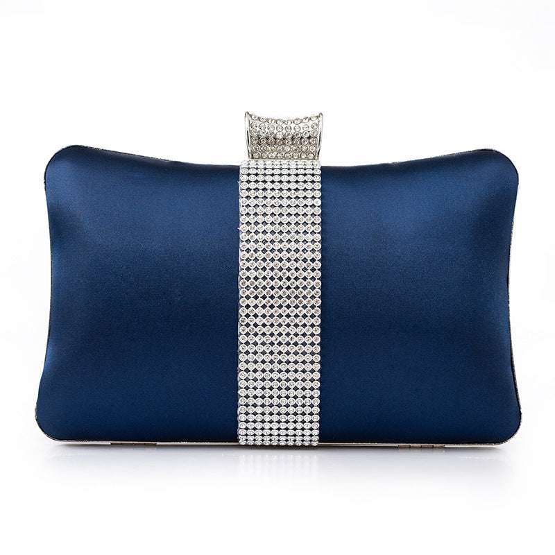 Navy blue satin banquet clutch with rhinestone strap and silver-toned frame edges