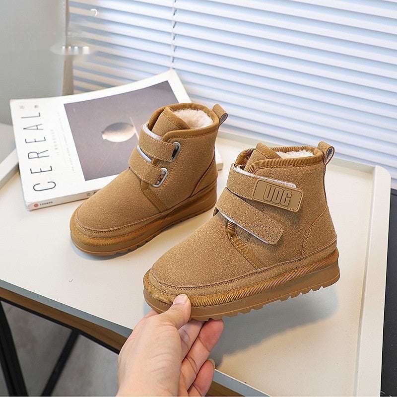 Fleece-lined snow boots in tan with two hook-and-loop straps and fleece lining.