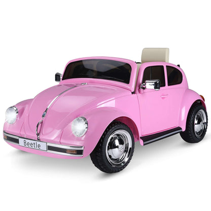 Pink kids electric ride-on car front-left view with headlamps and grille