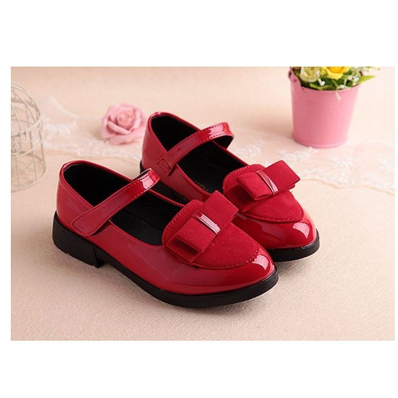 Kids leather school sneakers in red with two buckled straps and glossy round toe