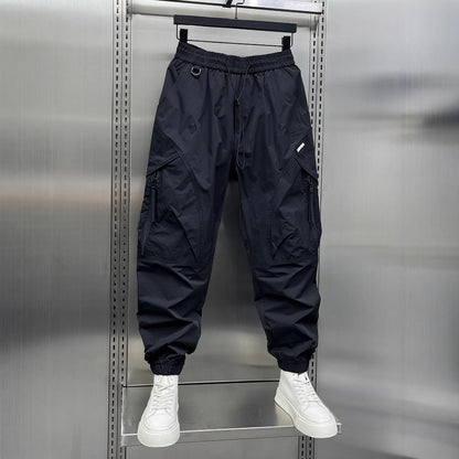 Men's tapered cropped pants, dark navy, drawstring waist and relaxed jogger cuffs