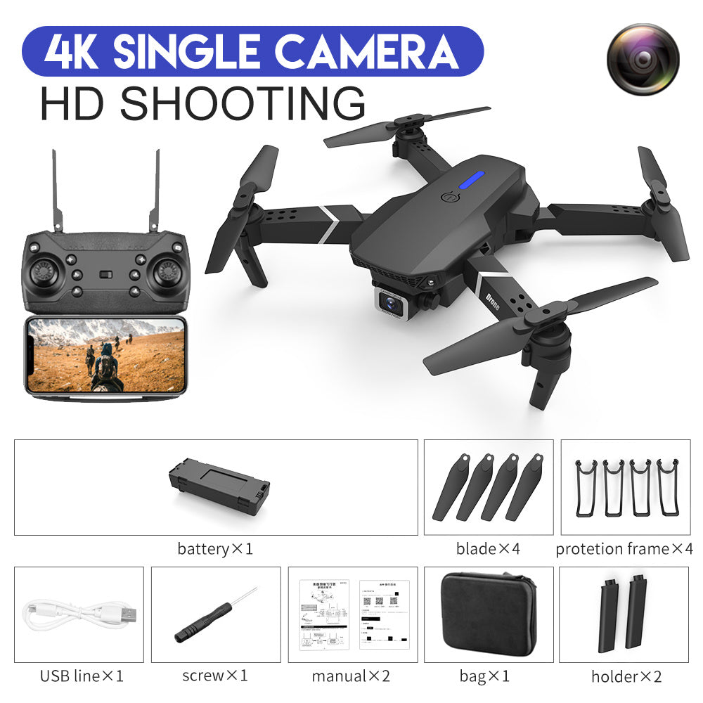 White quadcopter drone kit with remote controller, camera drone and spare blades