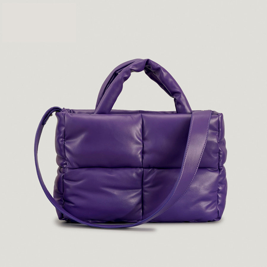Purple puffer one-shoulder handbag with diagonal strap and padded top handle