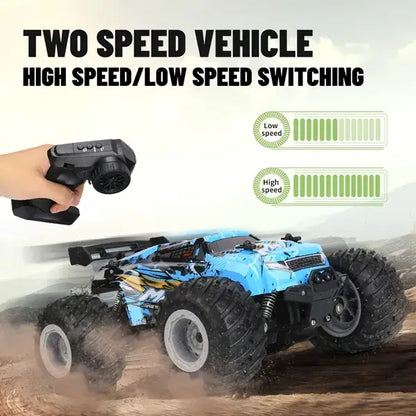 Blue off-road RC toy truck with chunky tires and remote-control speed indicator