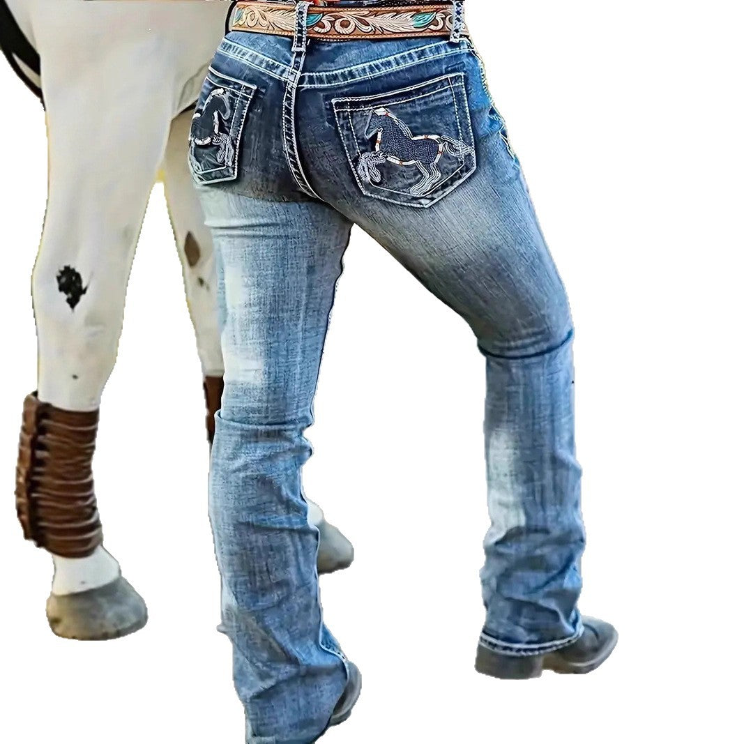Light blue straight-leg jeans with embroidered back pockets and visible yoke stitching