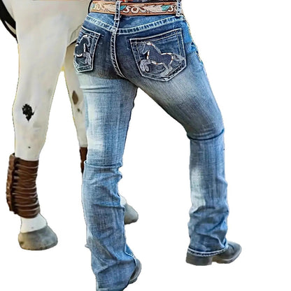 Light blue straight-leg jeans with embroidered back pockets and visible yoke stitching