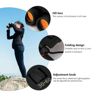 Black binoculars with orange lenses, folding hinge and focus adjustment knob