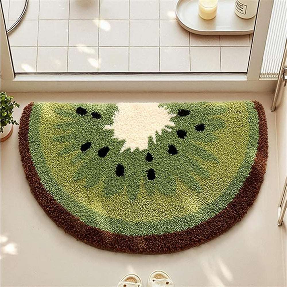 Kiwi fruit bath mat, green semicircle with white center and black seeds, brown border