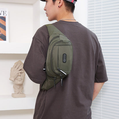 Green waist bag with zip pockets and adjustable crossbody strap