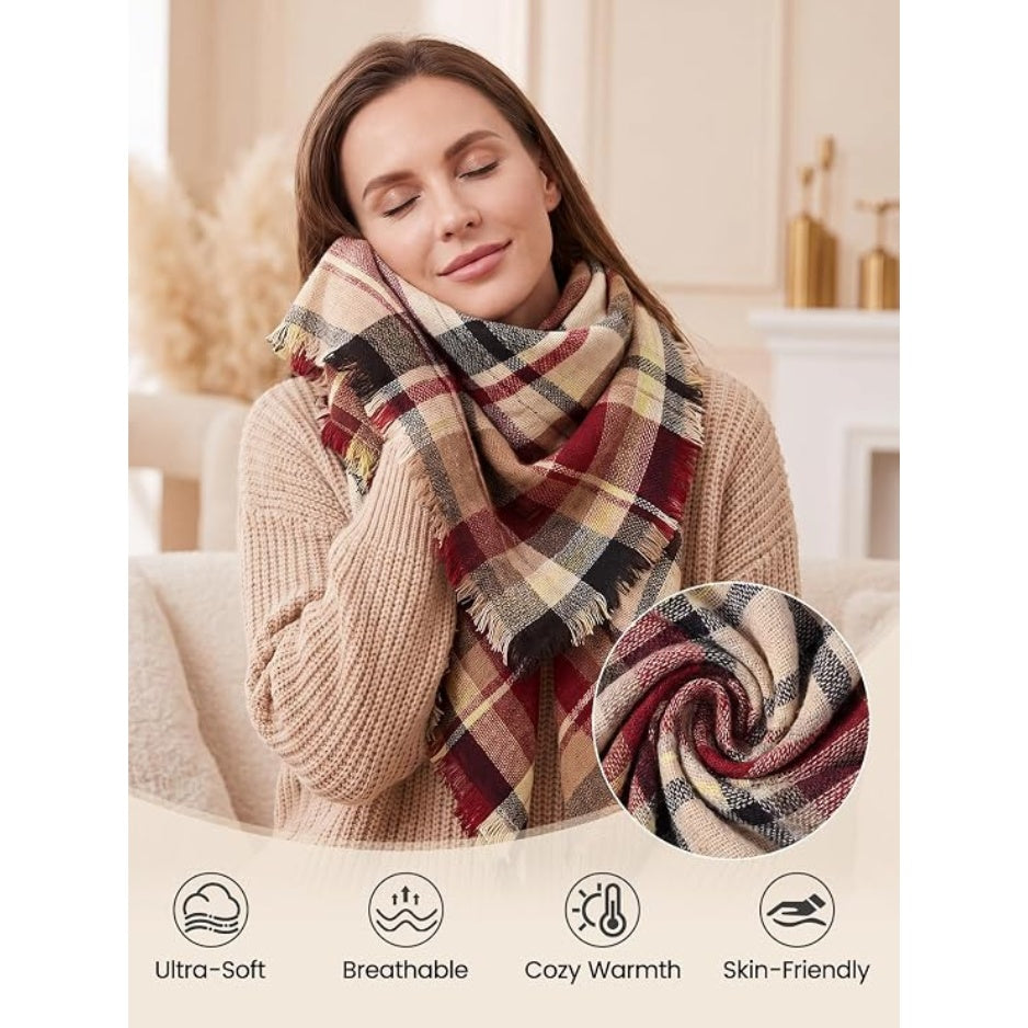 Plaid scarf with fringe in burgundy and cream, draped over a knit sweater