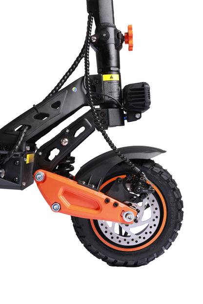 Close-up of electric scooter rear wheel and orange swing arm with brake disc
