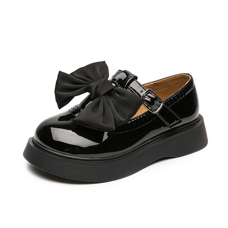 Girls’ black leather soft sole shoes with bow and side buckle on platform sole