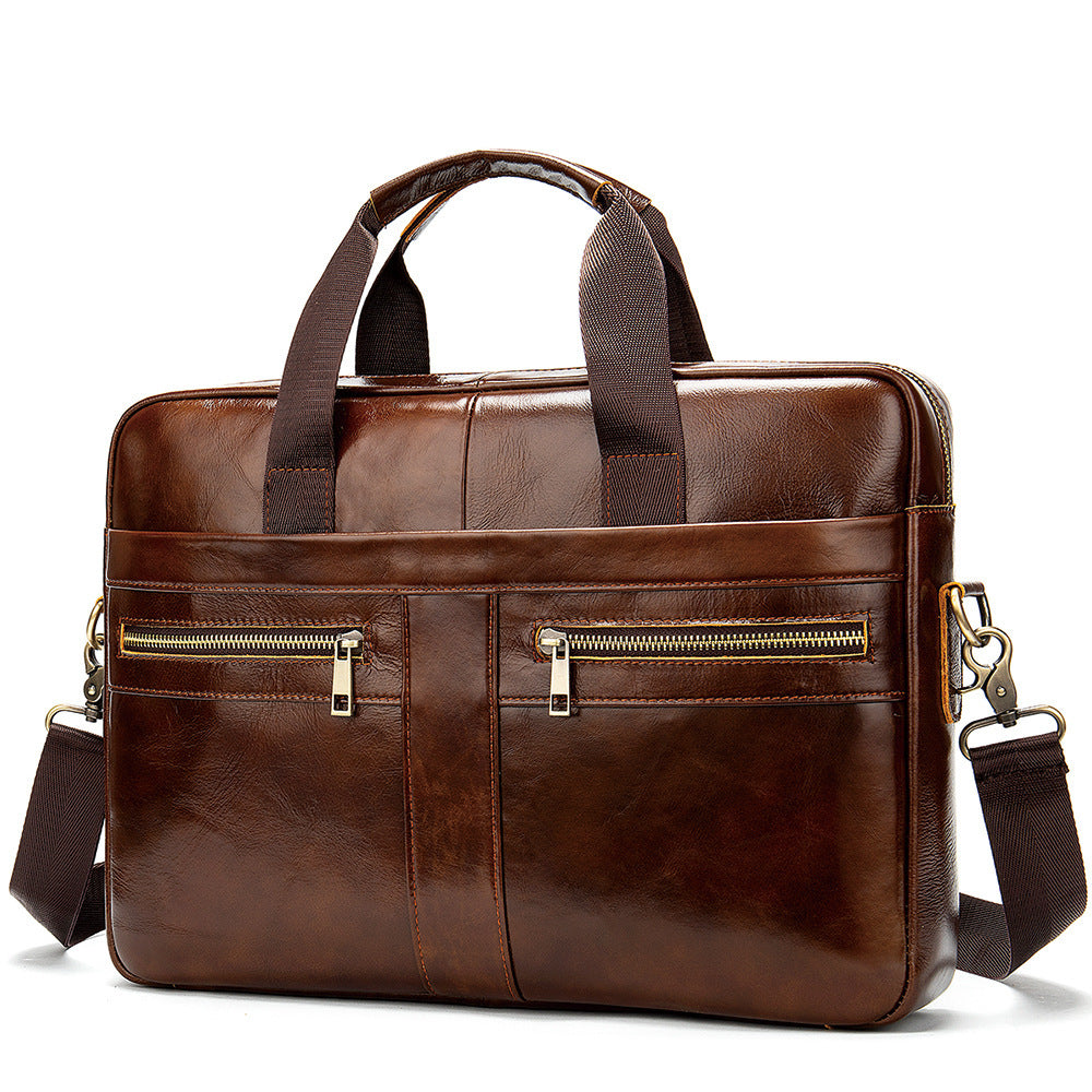 Men's dark brown leather briefcase with two front zip pockets and handles