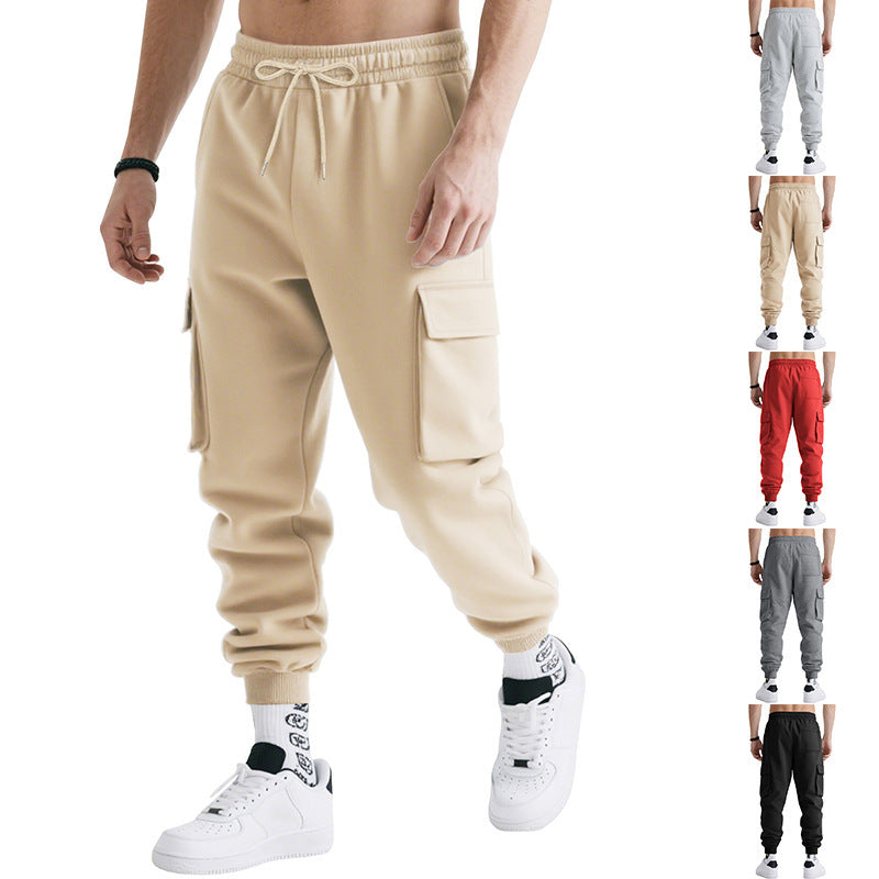 Men's loose cargo jogger pants with drawstring waist, side cargo pockets, beige, ribbed cuffs.