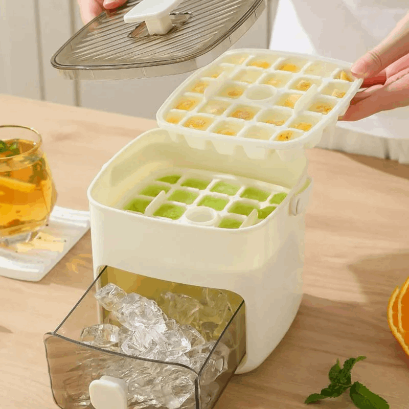 Two-layer ice cube mold tray with green and yellow grids, plus clear storage bin