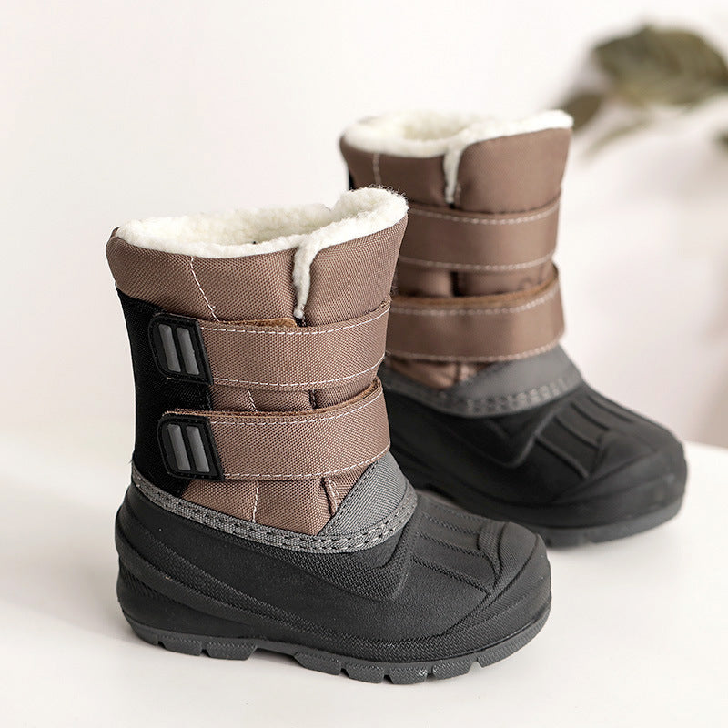 Kids winter snow boots in brown with white plush lining and two side buckles