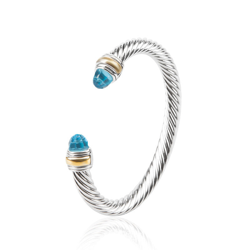Bohemian bracelet with silver wire and blue faceted crystal beads with gold accents
