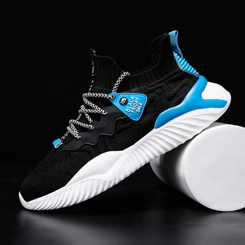 Black knit sneakers with blue heel detail and white ribbed sole