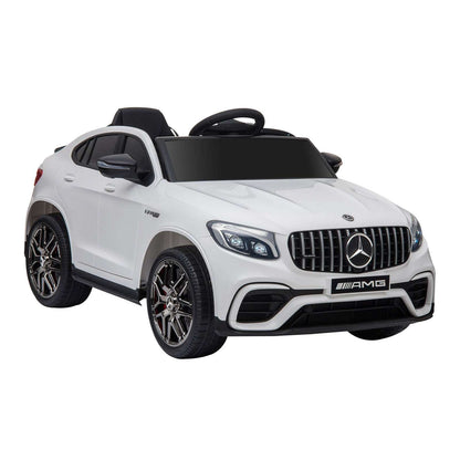 White kids 12V ride-on SUV front three-quarter view with black wheels and trim