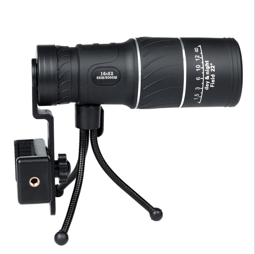 Black monocular telescope with tripod on a white background