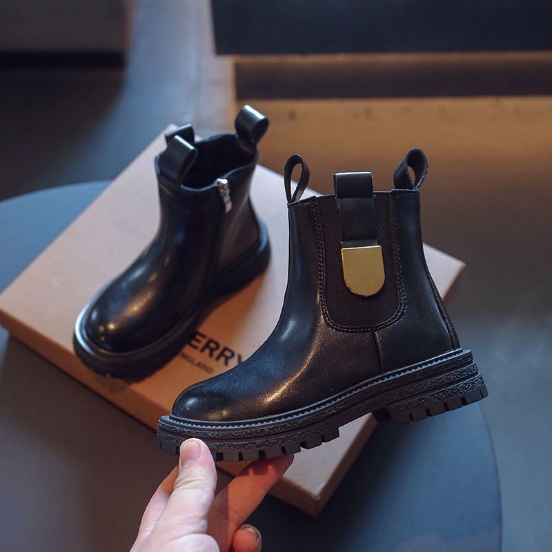 Kids Chelsea boots in dark brown with elastic gore, ankle tabs, and textured lug sole