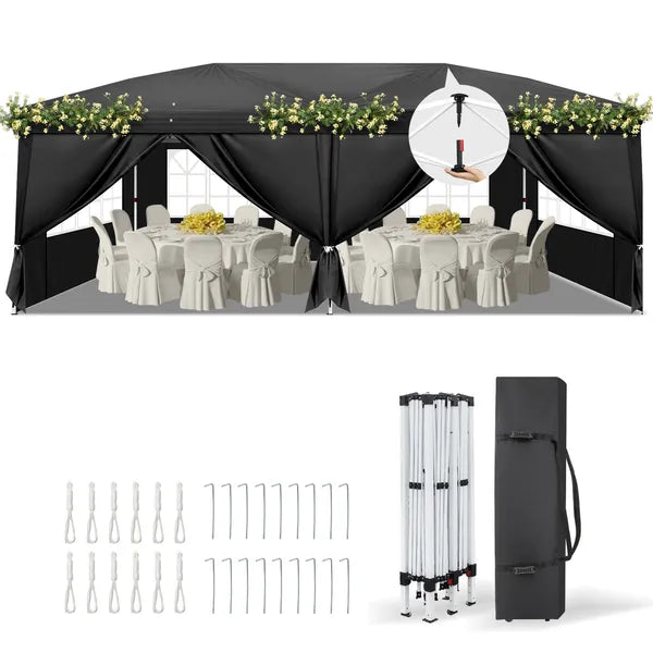 Black pop-up canopy tent front with valance curtains and covered table