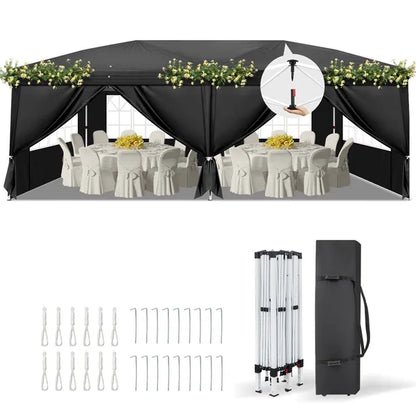 Black pop-up canopy tent front with valance curtains and covered table