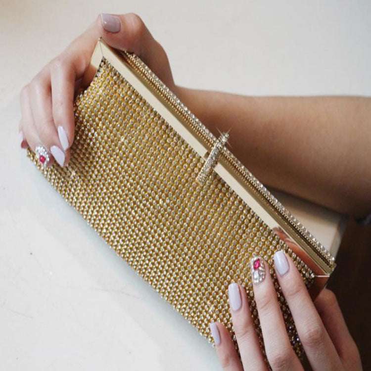 Rhinestone clutch bag with top-frame closure, gold sparkle with gold trim, rectangular