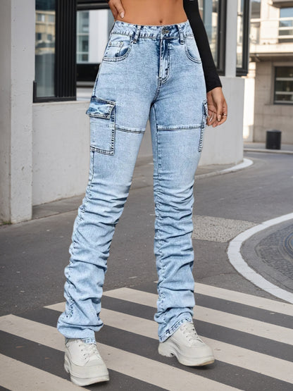 Women’s high-waisted light blue jeans with side patch pockets and belt loops