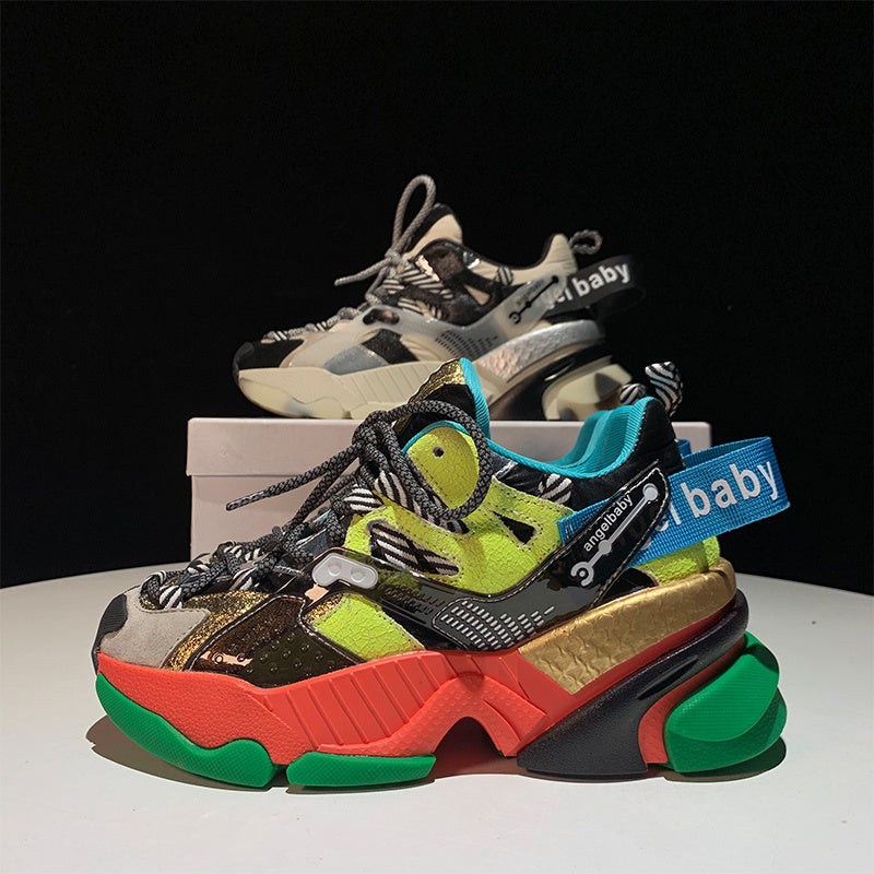 Color-block platform sneakers with green and orange panels, leopard detail, and chunky sole