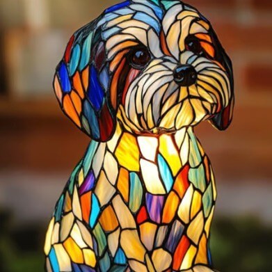Colorful dog-shaped lamp with white, blue, and orange mosaic finish, close-up head and chest