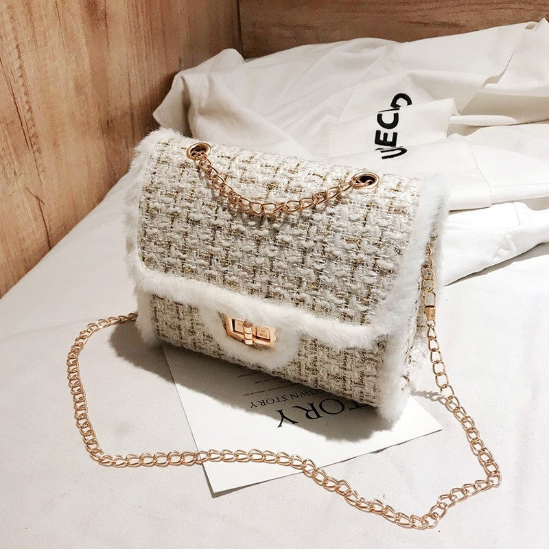 Cream plaid crossbody bag with gold chain strap, flap front and square clasp