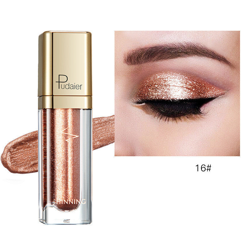 Glitter eyeshadow tube with rose gold shimmer and matching eyelid swatch, Tudaier