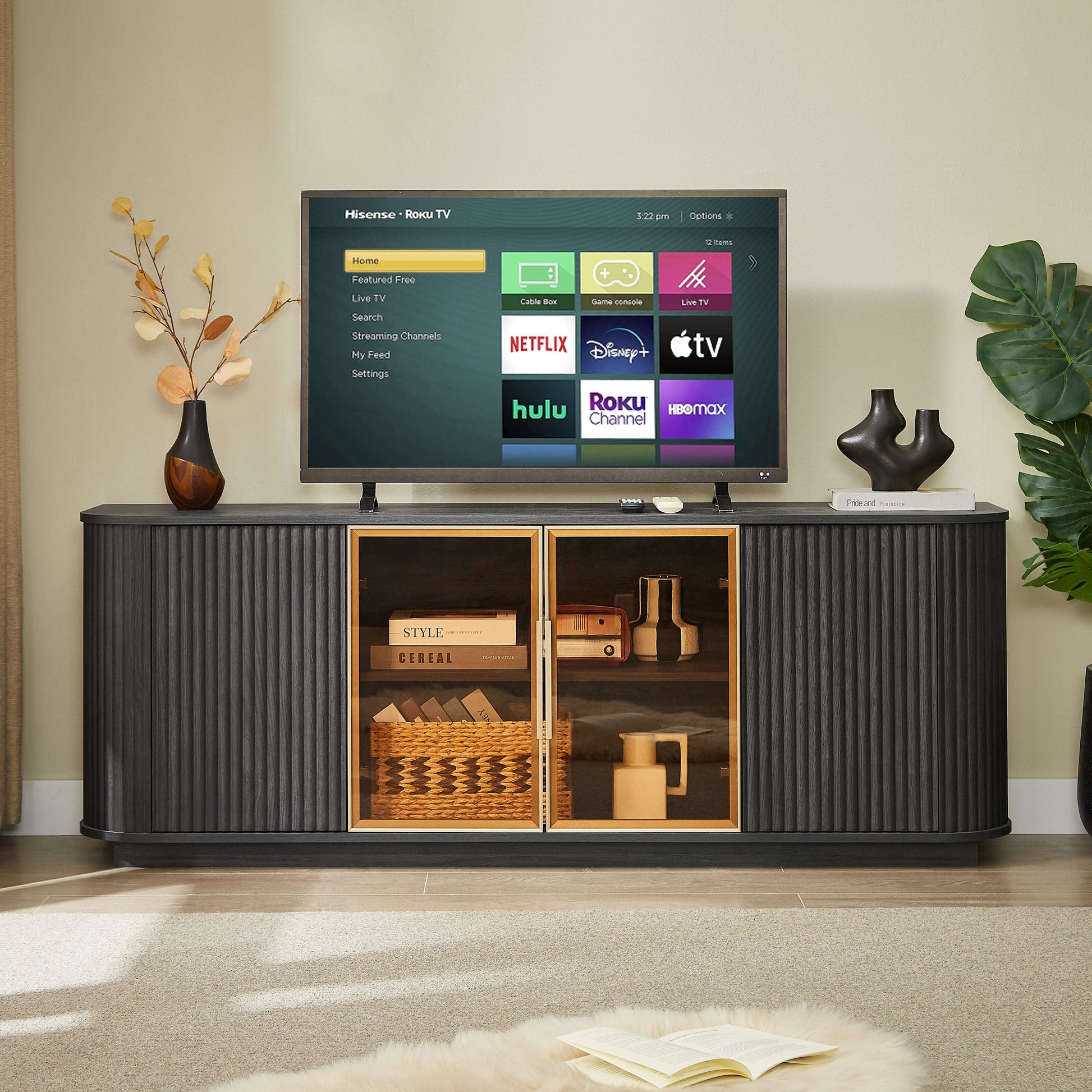 Black TV cabinet with LED-lit tempered-glass doors and wavy ribbed body