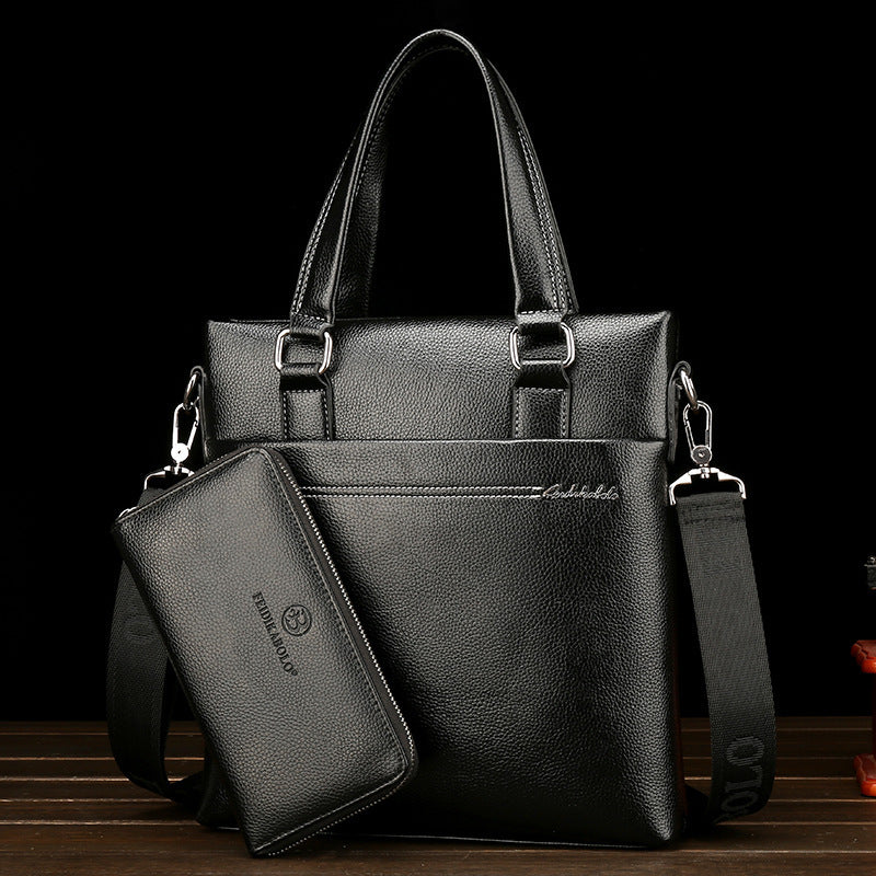 Men's leather one-shoulder computer bag with top handles and front zip pouch, dark color.
