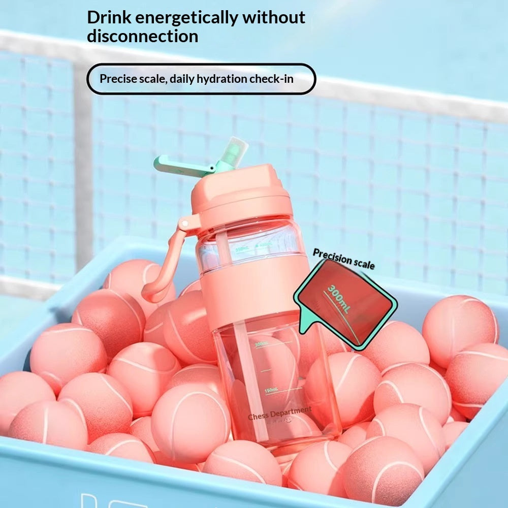 Coral-pink leak-proof water bottle with measurement markings and straw lid