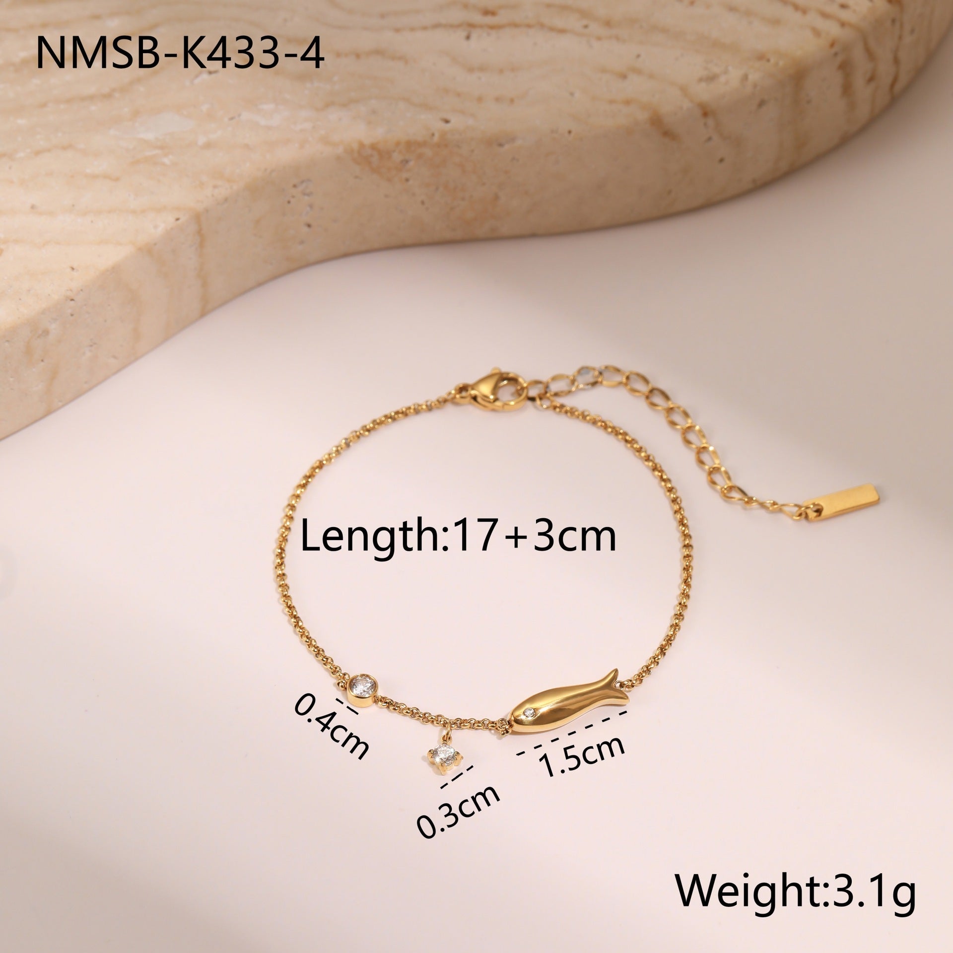 Gold-tone zircon charm bracelet with star charms and small round sparkle stones