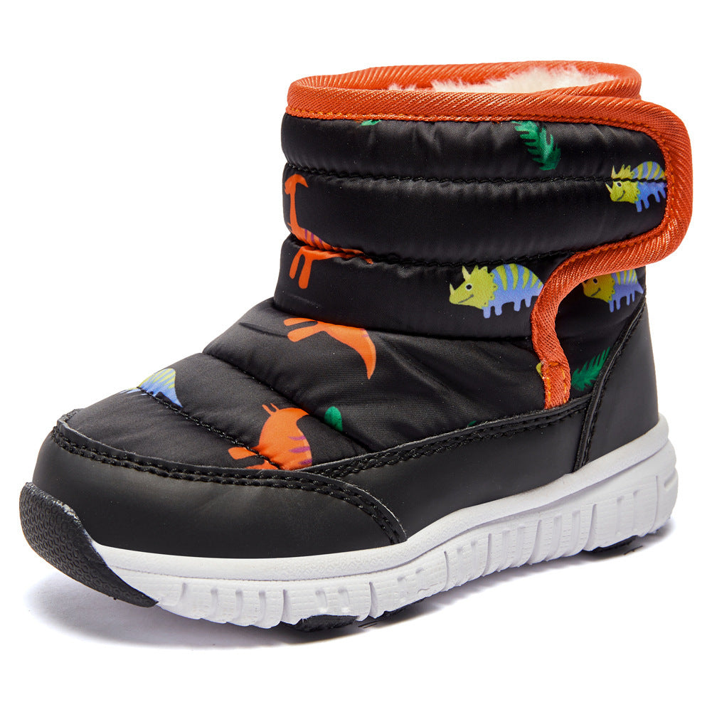Kids snow boots in black with orange trim, dinosaur print, and thick white tread sole