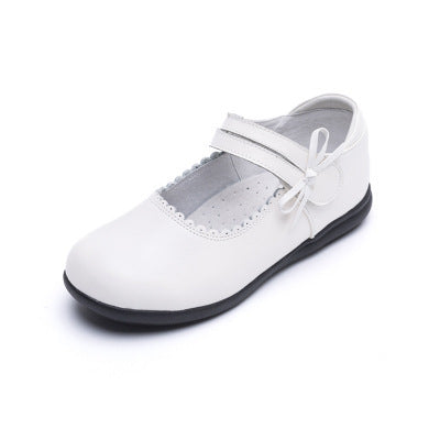 White leather princess shoes with white bow strap and perforated toe, low sole