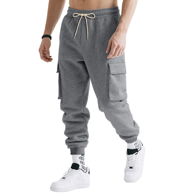 Men's loose cargo jogger pants with drawstring waist, side cargo pockets, dark gray, ribbed cuffs.
