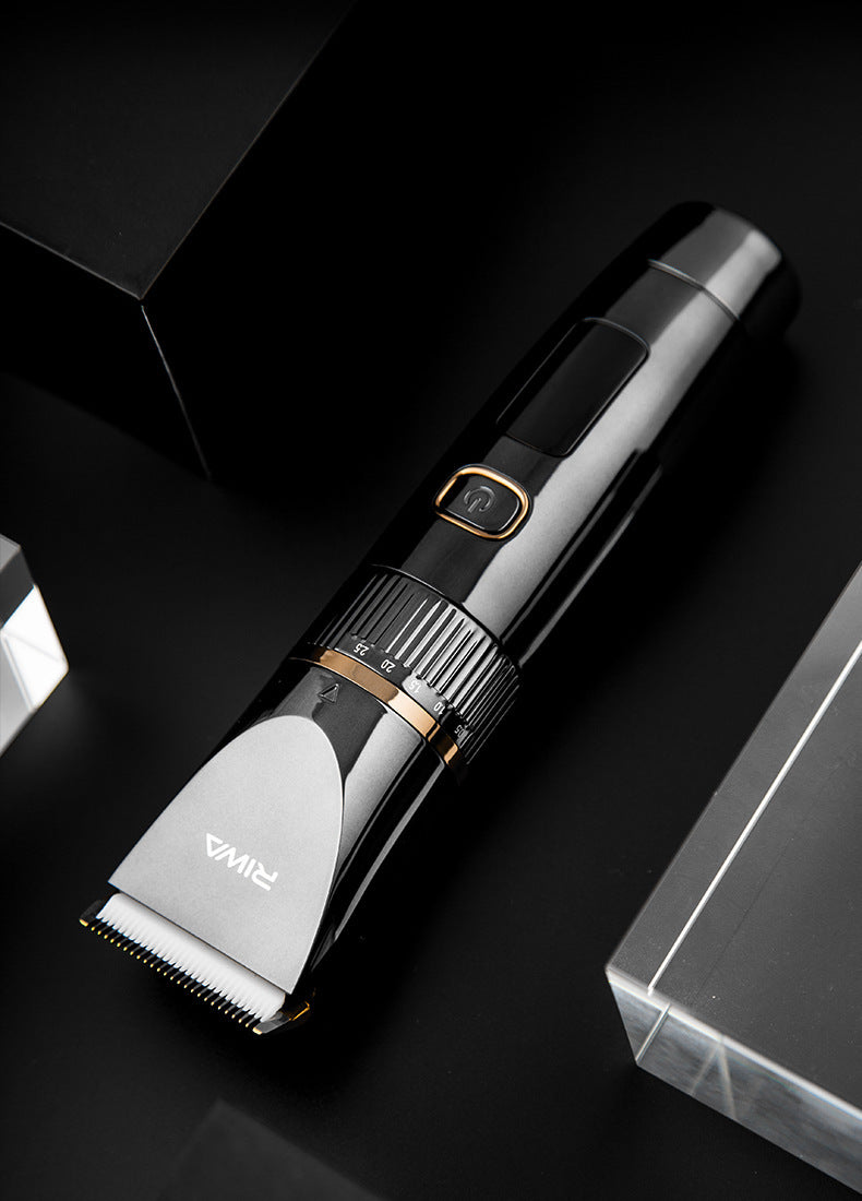 Hair trimmer on a dark reflective surface with a clear box in the background